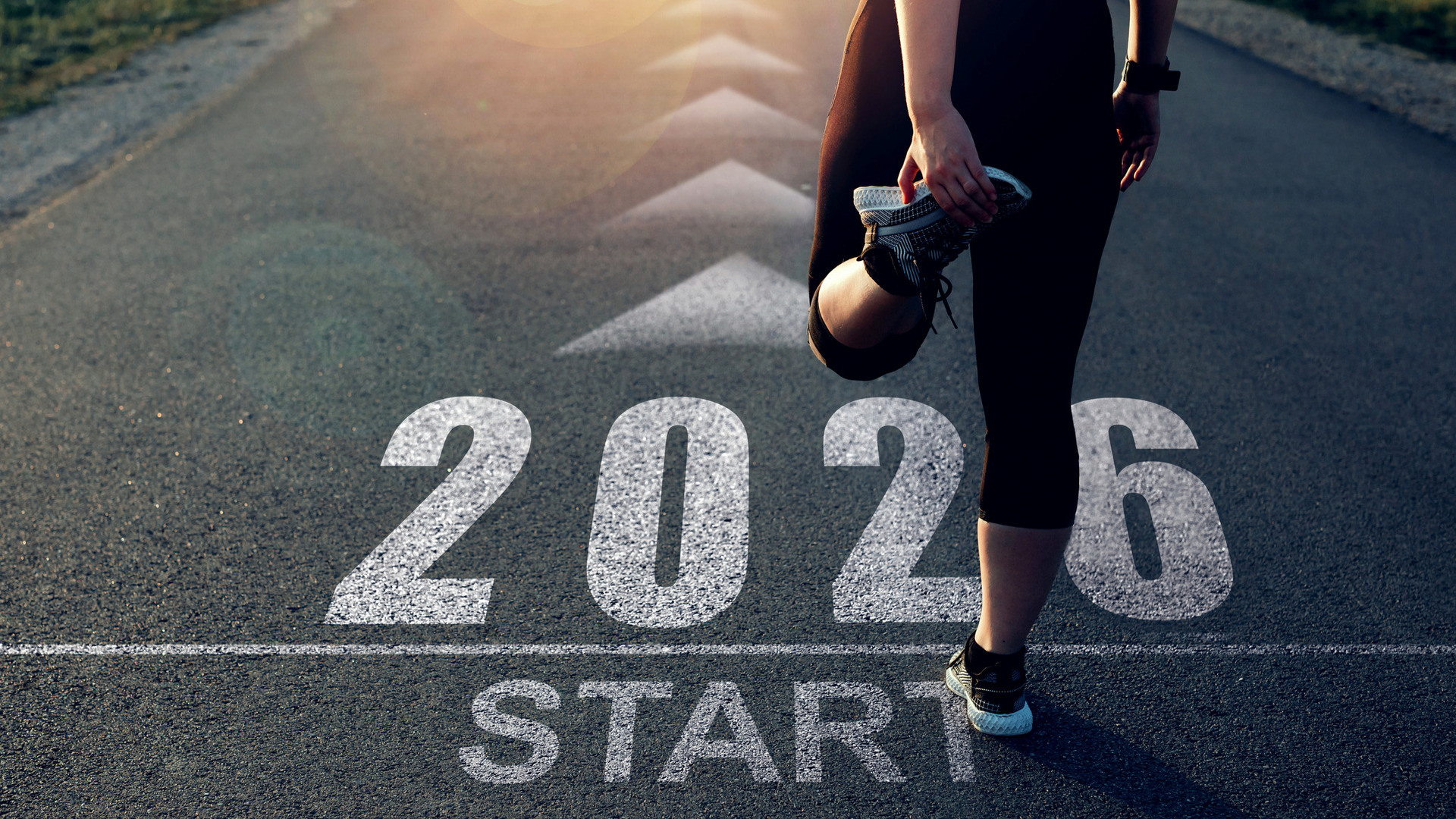 Kvinne står ved startstreken av 2026